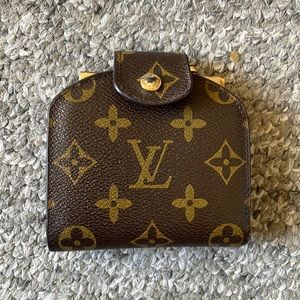 Louis Vuitton change purse/wallet.